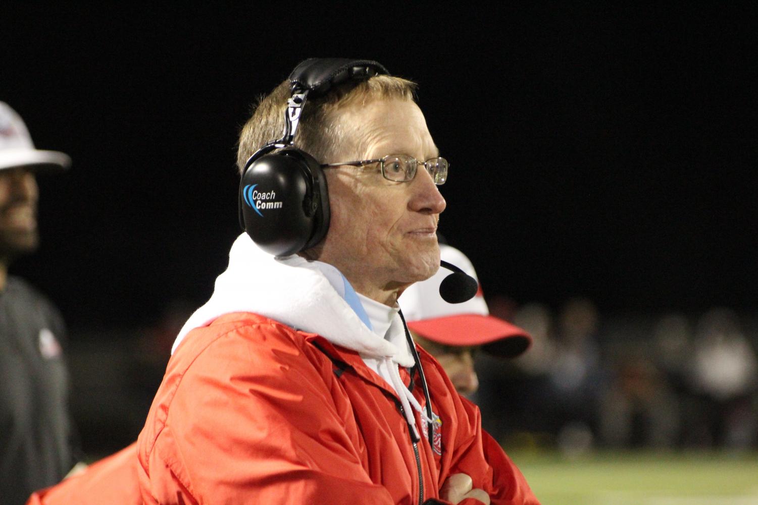 Coach Chris Knudsen coaches football team during the 2016-2017 season. Knudsen looks forward for retirement.