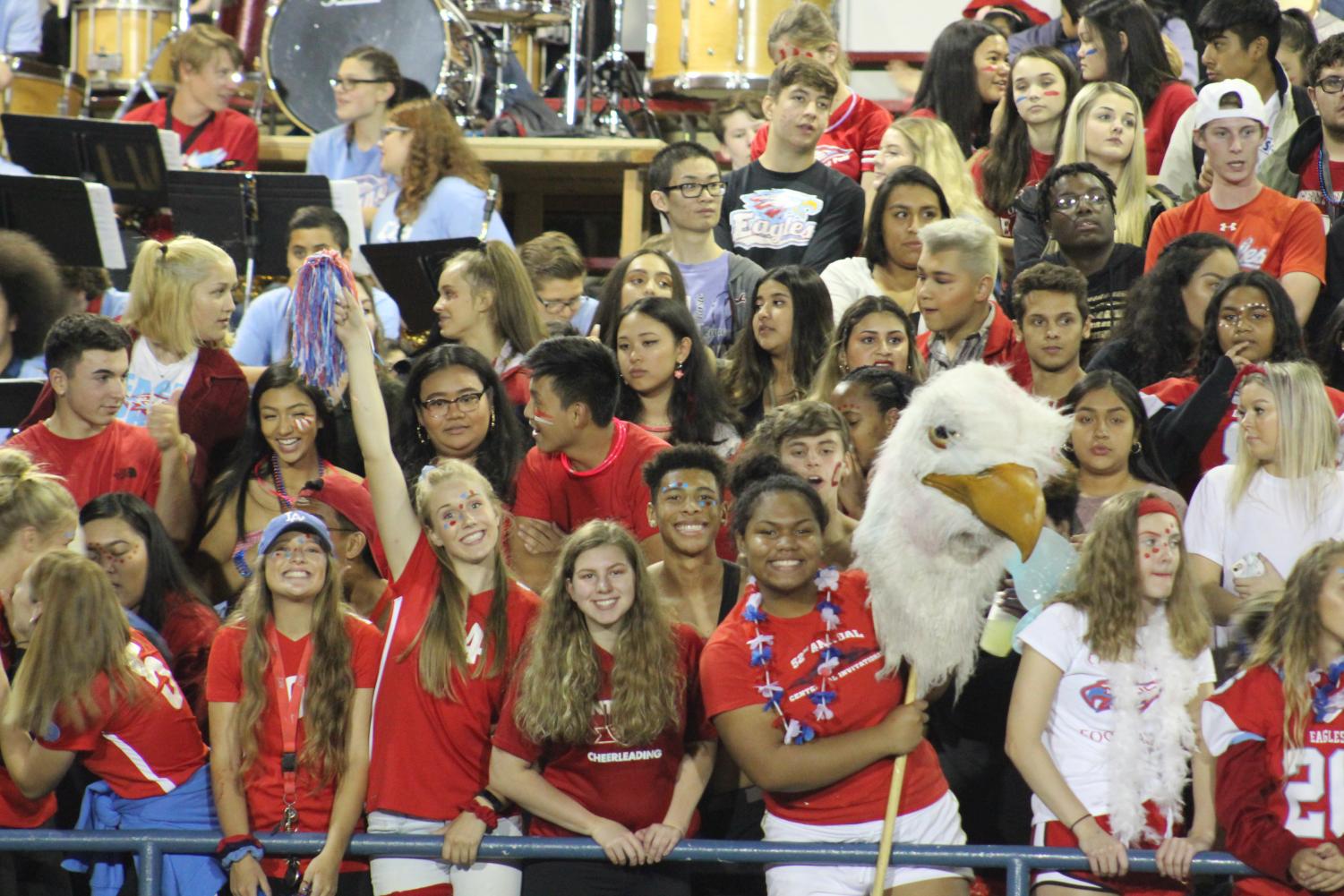 Students cheer in the stands at Homecoming. The football team heads to McMinnville for Friday's game.