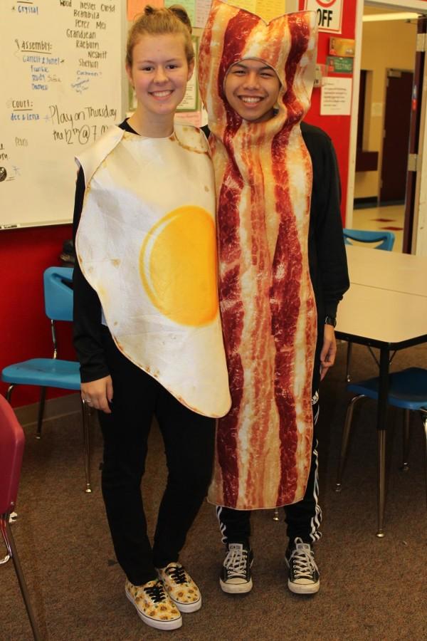 Tommy Nguyen and Courtney Perry show their senior spirit as breakfast foods. 