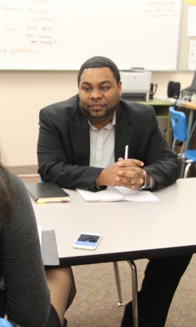 Human Resource Director Dr. Paul Coakley discusses the new contract negotiation process with a reporter last week.