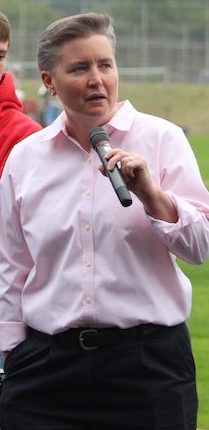 Science teacher Kate Dean talks to the school on how students motivated on during an outdoor assembly.  She was awarded the The Presidential Award for Excellence in Mathematics and Science Teaching. 
Photo by S Vawter