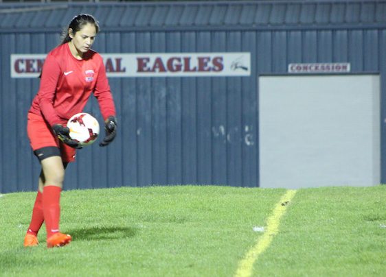 Alyssa Guthrie kicks the ball back into play. 