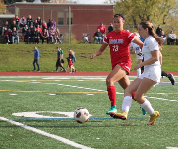 Senior Lani Saechin defends Grant outside wing Ally Lee in last Saturdays 4-1 playoff game. 