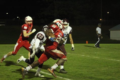 Senior Jesse Porter turns the corner against the Franklin defense.