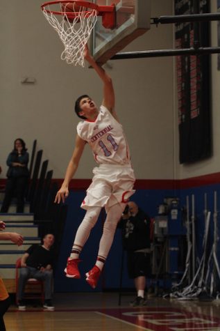 Brendan Ritschard, shown here in a game last season, is one of 8 seniors on this year's basketball team. File photo.