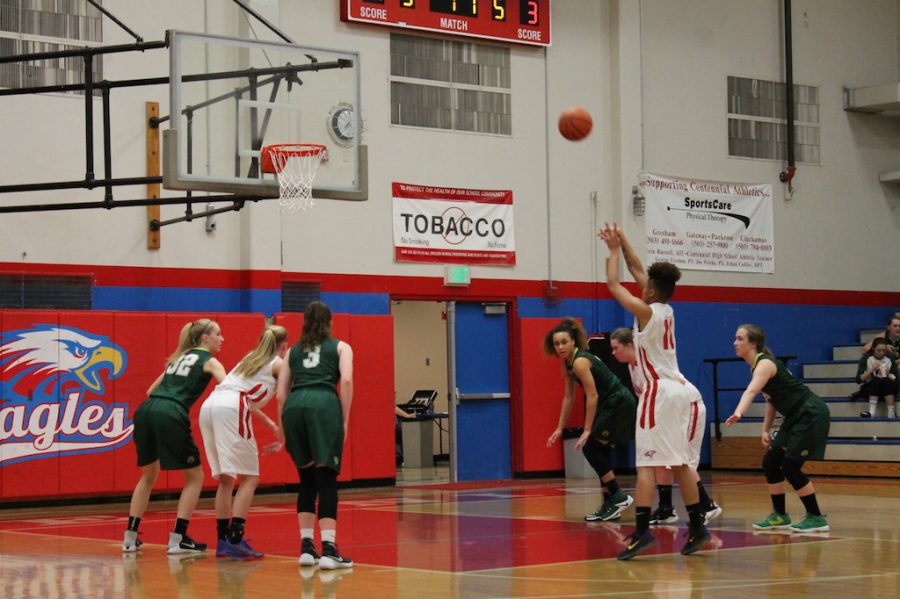 Senior Gianna Loville attempts a free-throw in Centennials opener.