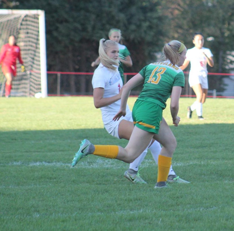 Chloe Smith (number 2) runs in for the ball. Girls soccer tackles Silverton Monday, away at 7.