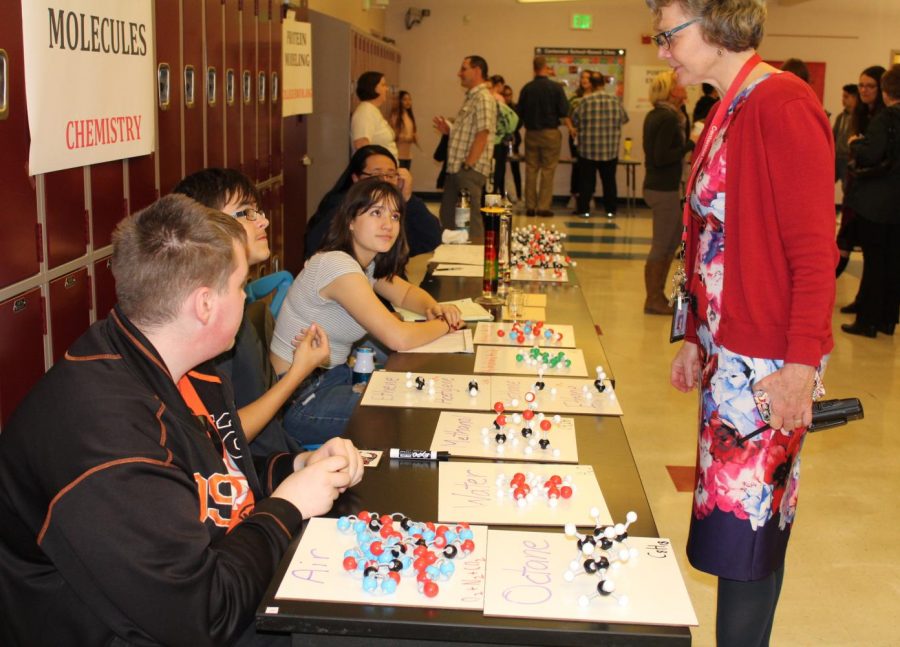 Mairi Scott-Aguirre observing a Chemistry exhibit at Expo Night 2017. Expo Night this year is October 18.